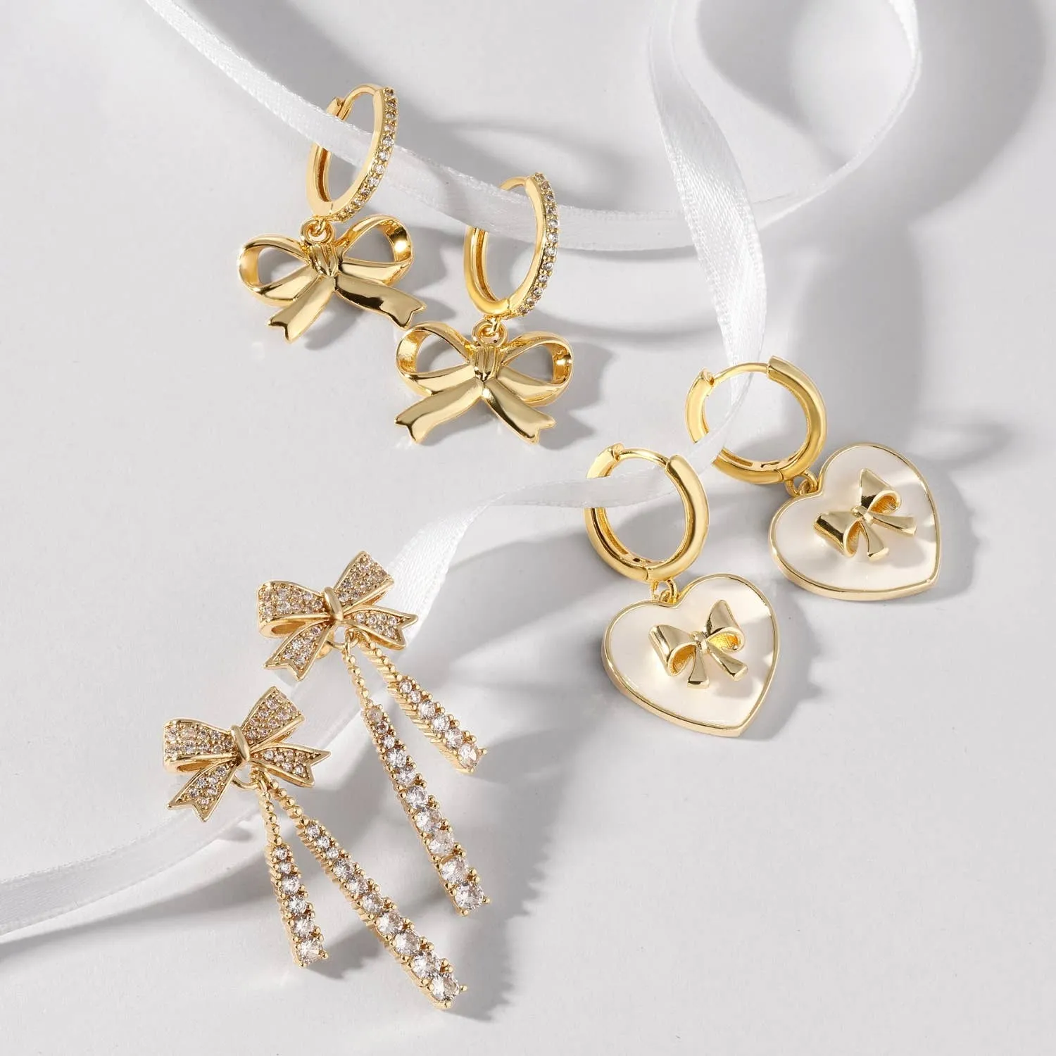 Huggies with Bow Accented White Heart - Gold